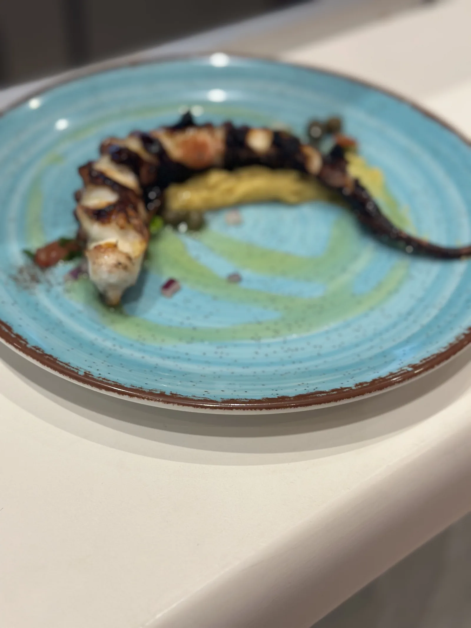 Grilled octopus at a Greek restaurant in Milos