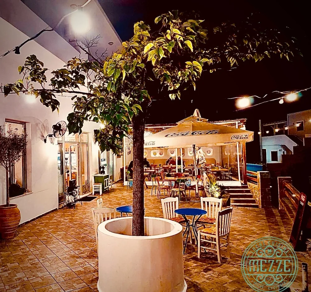 Mezze Milos restaurant at night in Milos